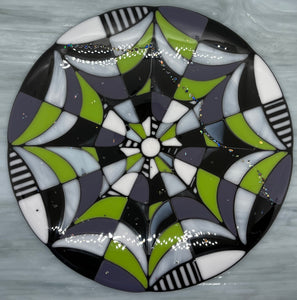 Beautifully Broken:  12” diameter fused web, with colors inspired by Beetlejuice.