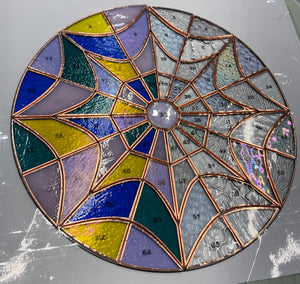 Tiny web made with bullsyse transparent glass, 10” diameter