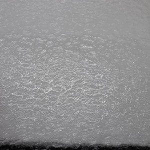 O100G oceanside clear granite 96 COE 12 x 12