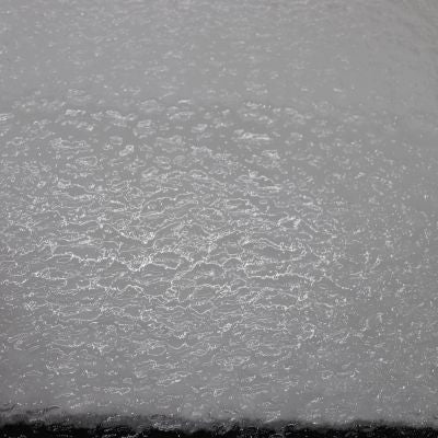 O100G oceanside clear granite 96 COE 12 x 12