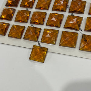 SALE:  18mm square medium amber faceted jewel